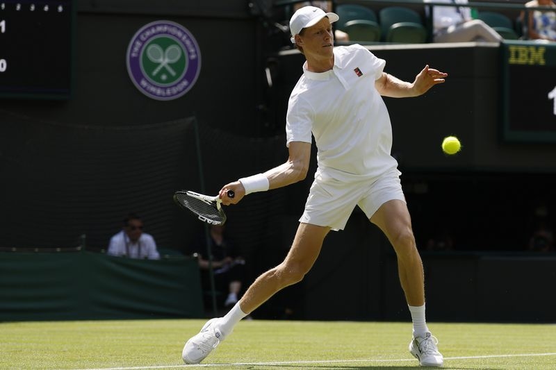 Tennis-Sinner cruises as Wimbledon seeds fall, Krejcikova survives
