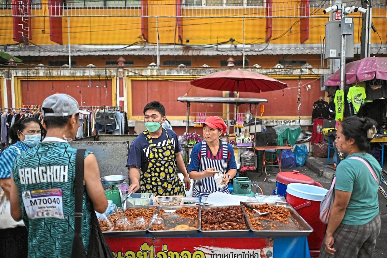 Thai leader's suspension deals new blow to battered economy