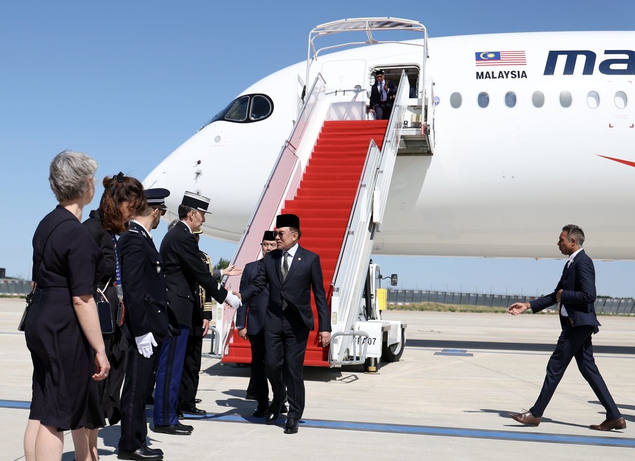 Anwar lands in Paris for his inaugural visit as Prime Minister
