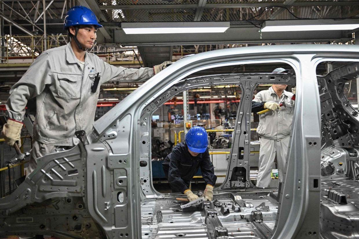 China's EV price war dashes profit hopes of 90% of brands, AlixPartners says