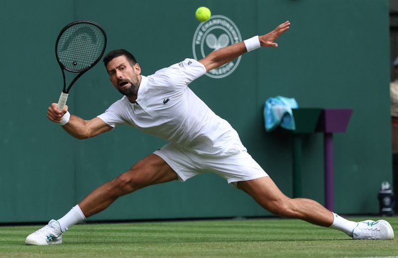 Tennis-Djokovic hits century to lead veterans into last 16, Krejcikova crashes
