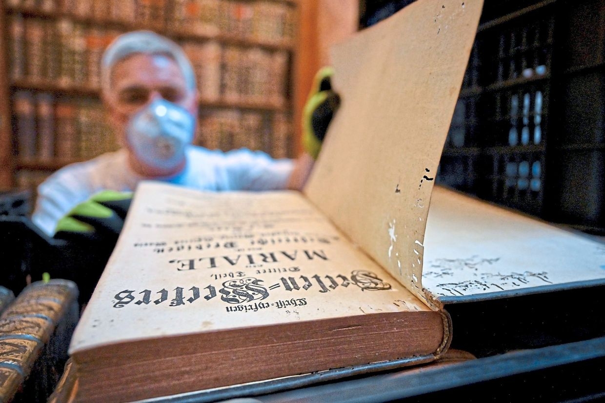 Hungary's oldest library battles beetles to save 100,000 books