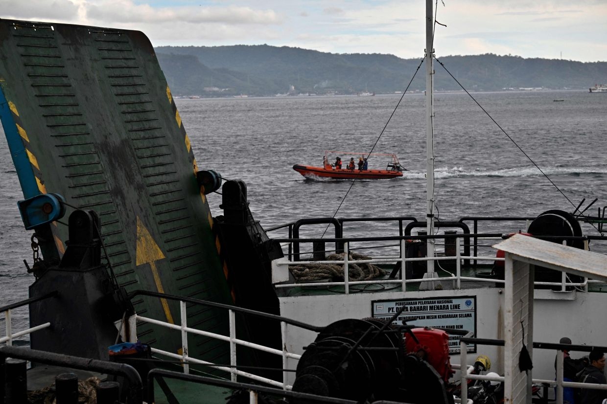Indonesian search teams confirm finding ferry wreckage