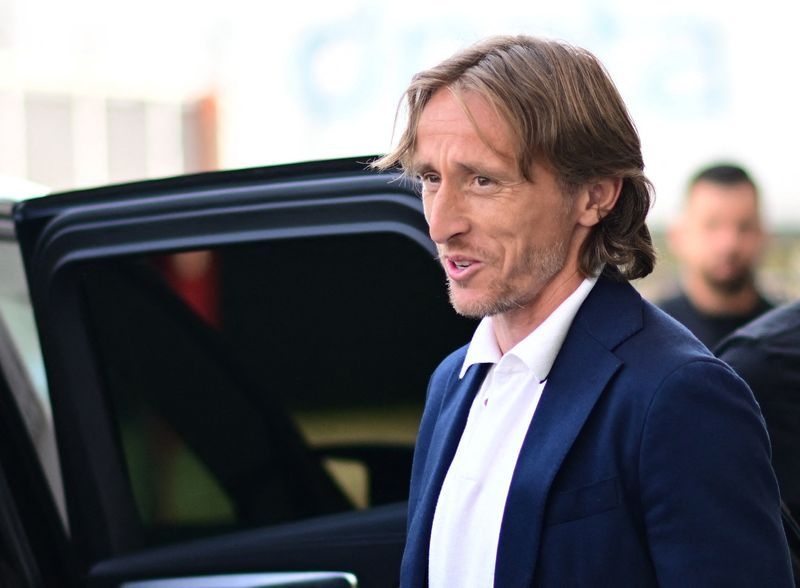Soccer-Modric joins Milan in one-year deal