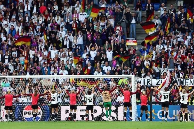 Soccer-Euro 2025 group games draw record crowds
