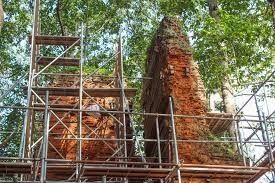 Archaeologists restoring ninth brick tower of Bakong temple in Cambodia's famed Angkor park