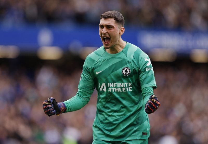 Soccer-Bournemouth sign keeper Petrovic from Chelsea on a five-year deal