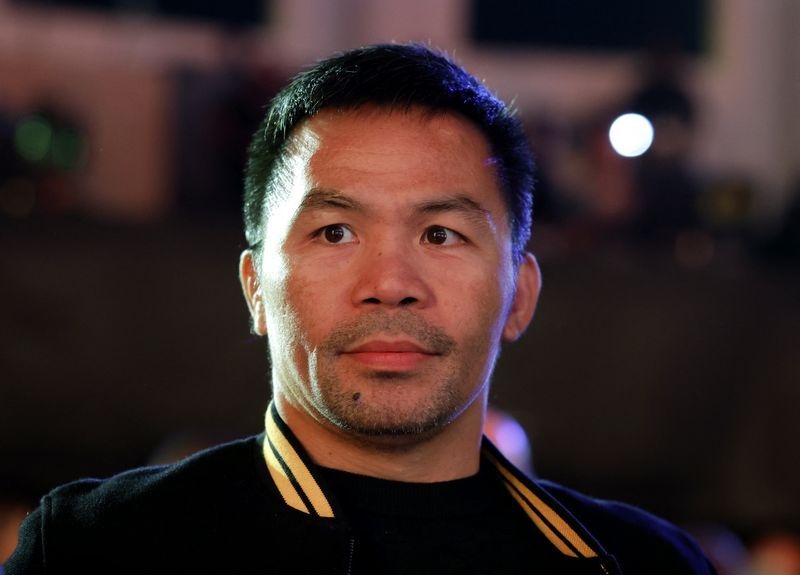 Boxing-Pacquiao ready to spring surprise as he targets Barrios' belt in comeback fight