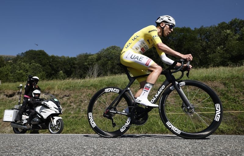 Cycling-Pogacar extends Tour lead with time trial victory