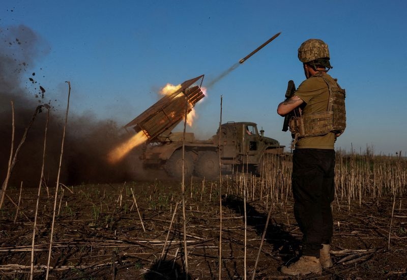 Ukraine's top commander says troops standing firm outside key city