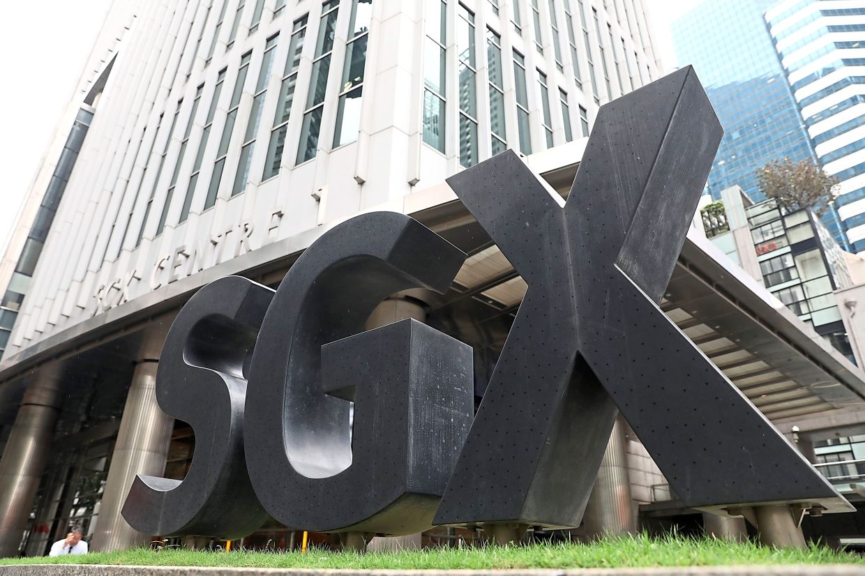 Singapore hits record high for 14th session, sets the pace for Asian equities