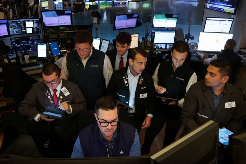 Nasdaq, S&P hit record levels as megacaps rise ahead of tech earnings