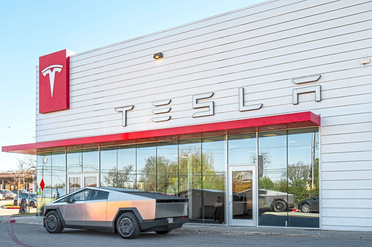As Tesla US sales dip, GM's EVs close the gap