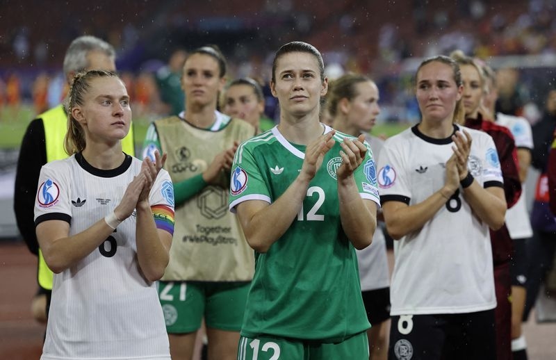 Soccer-Players say future bright for Germany despite semi-final loss to Spain