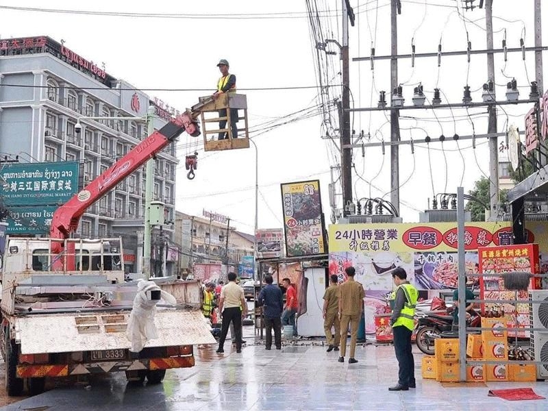 Lao capital cracks down on illegal awnings, signs