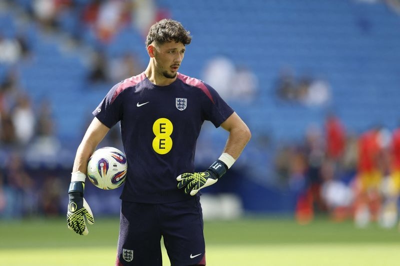 Soccer-Man City re-sign goalkeeper Trafford from Burnley on five-year deal