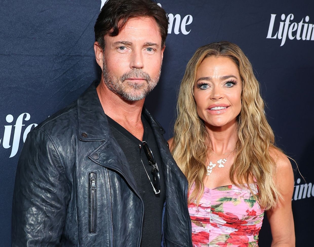 Denise Richards accuses estranged husband of illegally leaking her nude photos