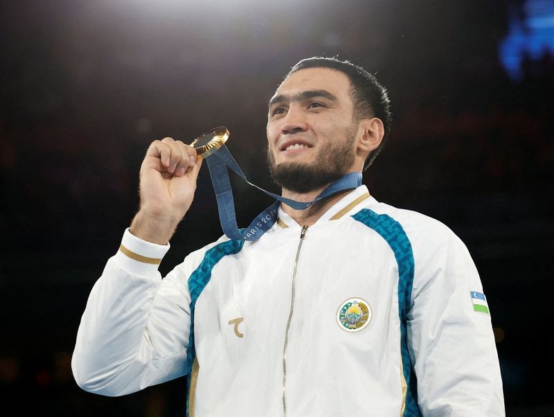 Boxing-Olympic champion Mullojonov provisionally suspended for banned substance