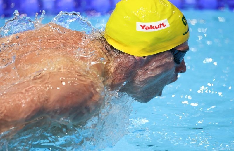 Swimming-'Dirty gold! Let's Go!' Australia's Turner stunned by 200 butterfly bronze