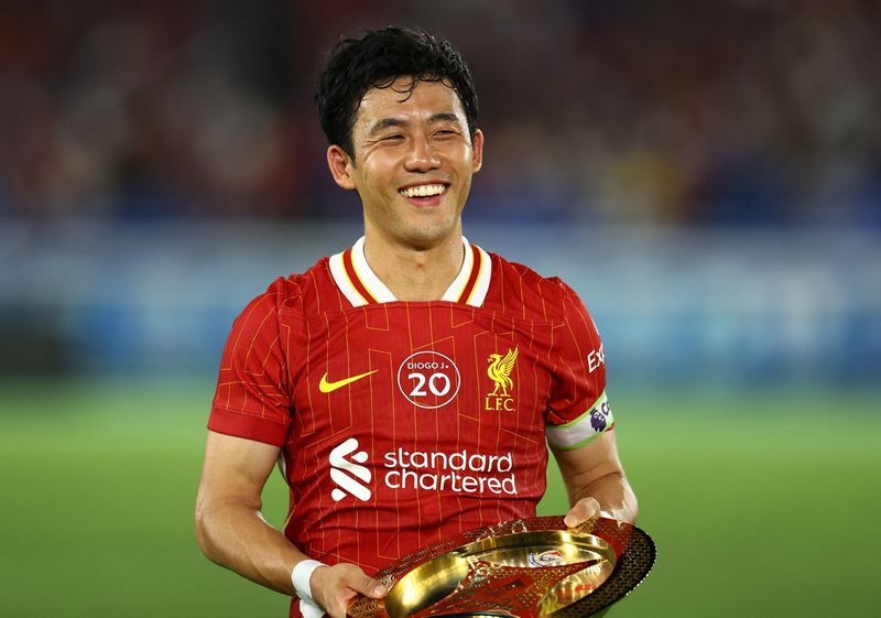 Soccer-Endo recalls unsuccessful Yokohama trial as he captains Liverpool against hometown club
