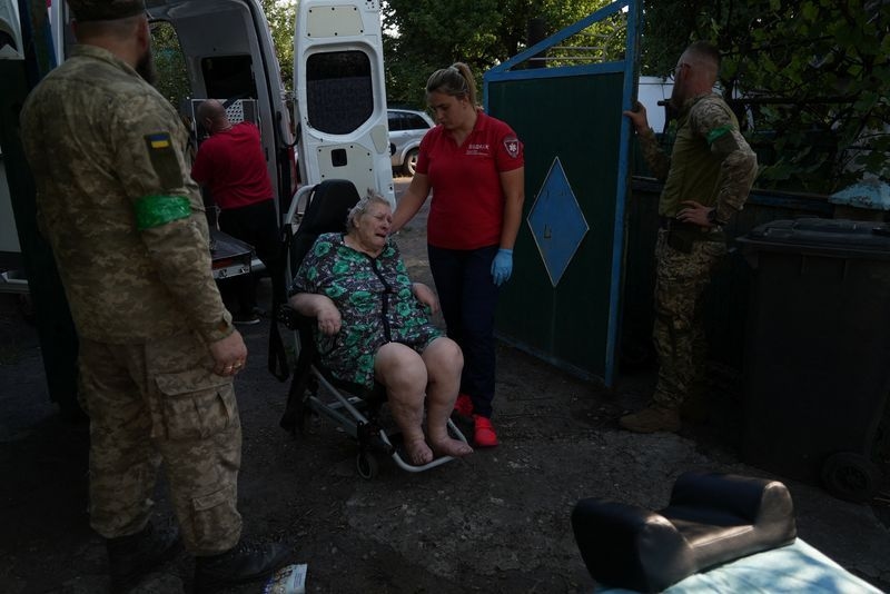 As Russia advances, Ukrainians flee once-sleepy mining town