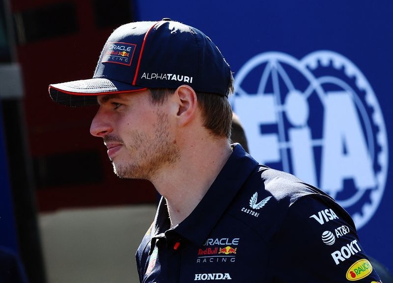 Motor racing-Verstappen confirms he will stay at Red Bull next year