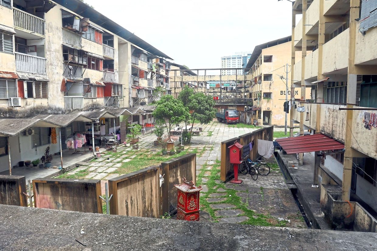 Ipoh folk hold on to home at Waller Court amid decay