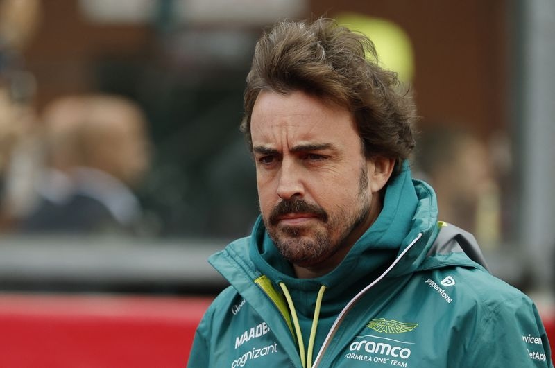 Motor racing-Alonso to miss first Hungarian GP practice due to back injury