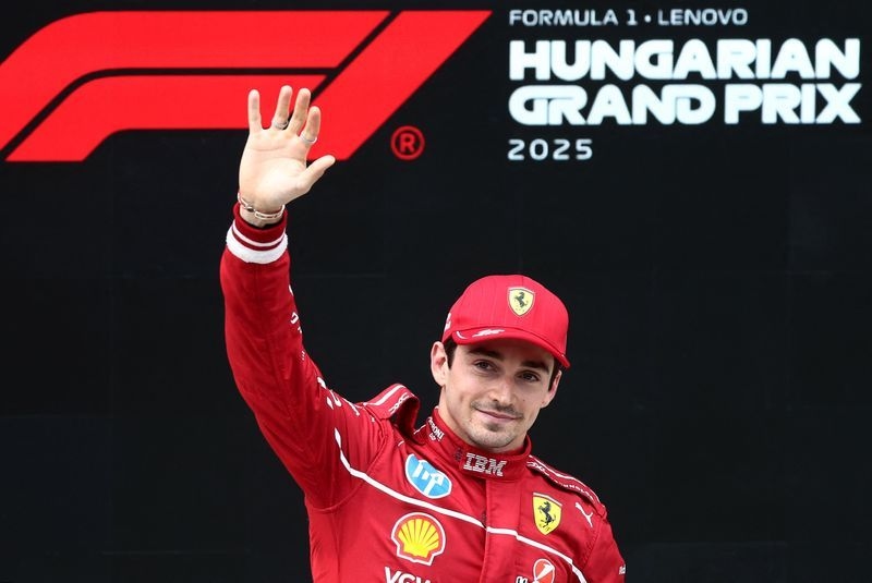 Motor racing-Leclerc puts Ferrari on pole in Hungary