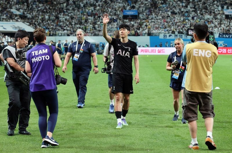 Soccer-Tottenham's Son bids emotional farewell in S.Korea, Maddison suffers knee injury