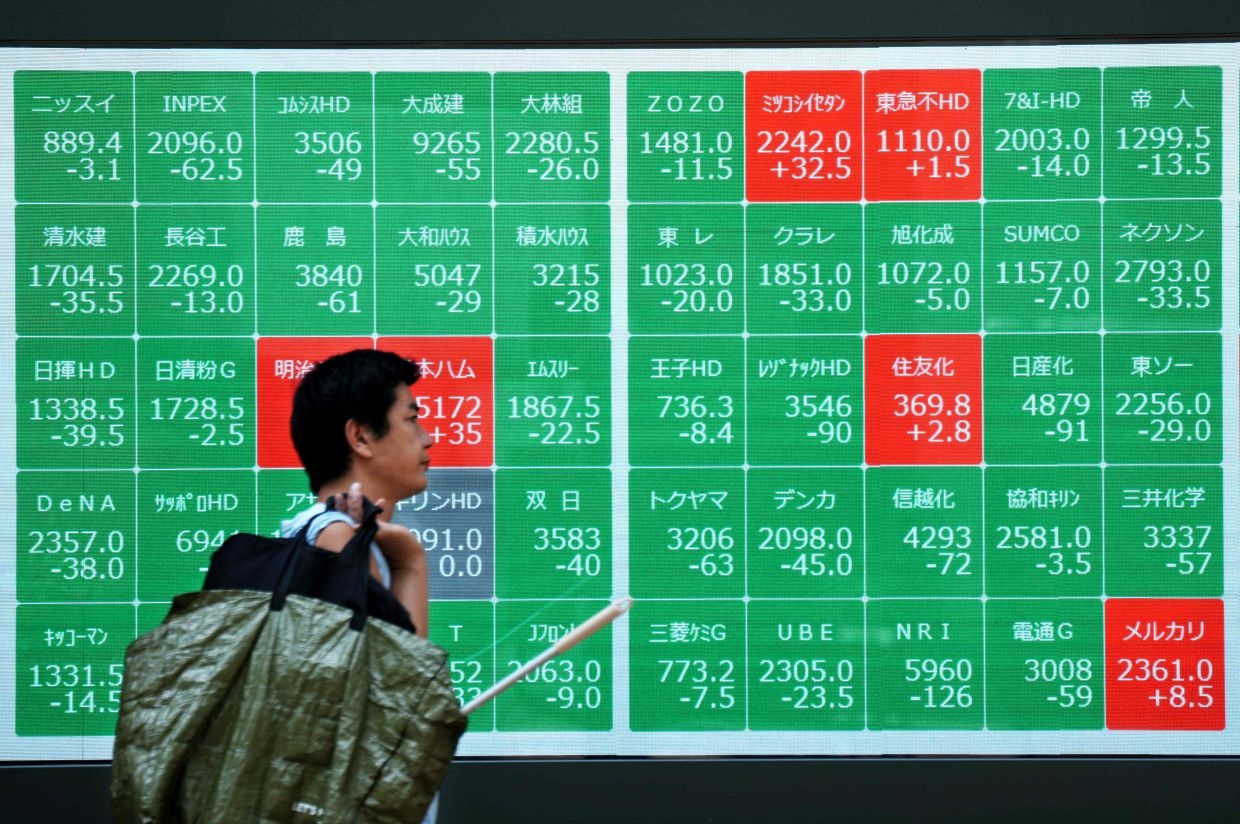 Asian markets track Wall St rally on Fed rate cut bets