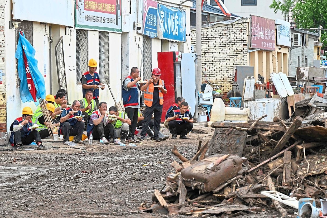 Authorities lift Beijing rain alert