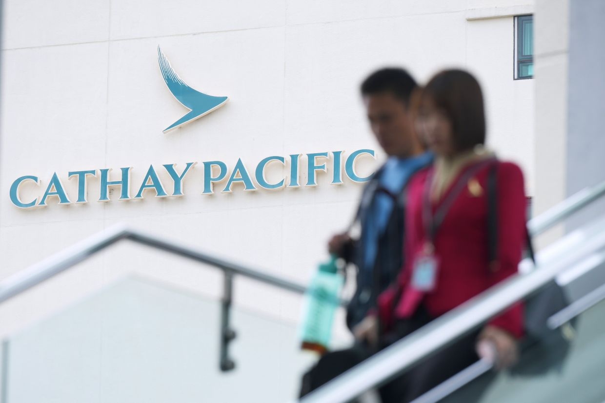 Hong Kong's Cathay posts 1.1% rise in first-half net profit, orders new planes