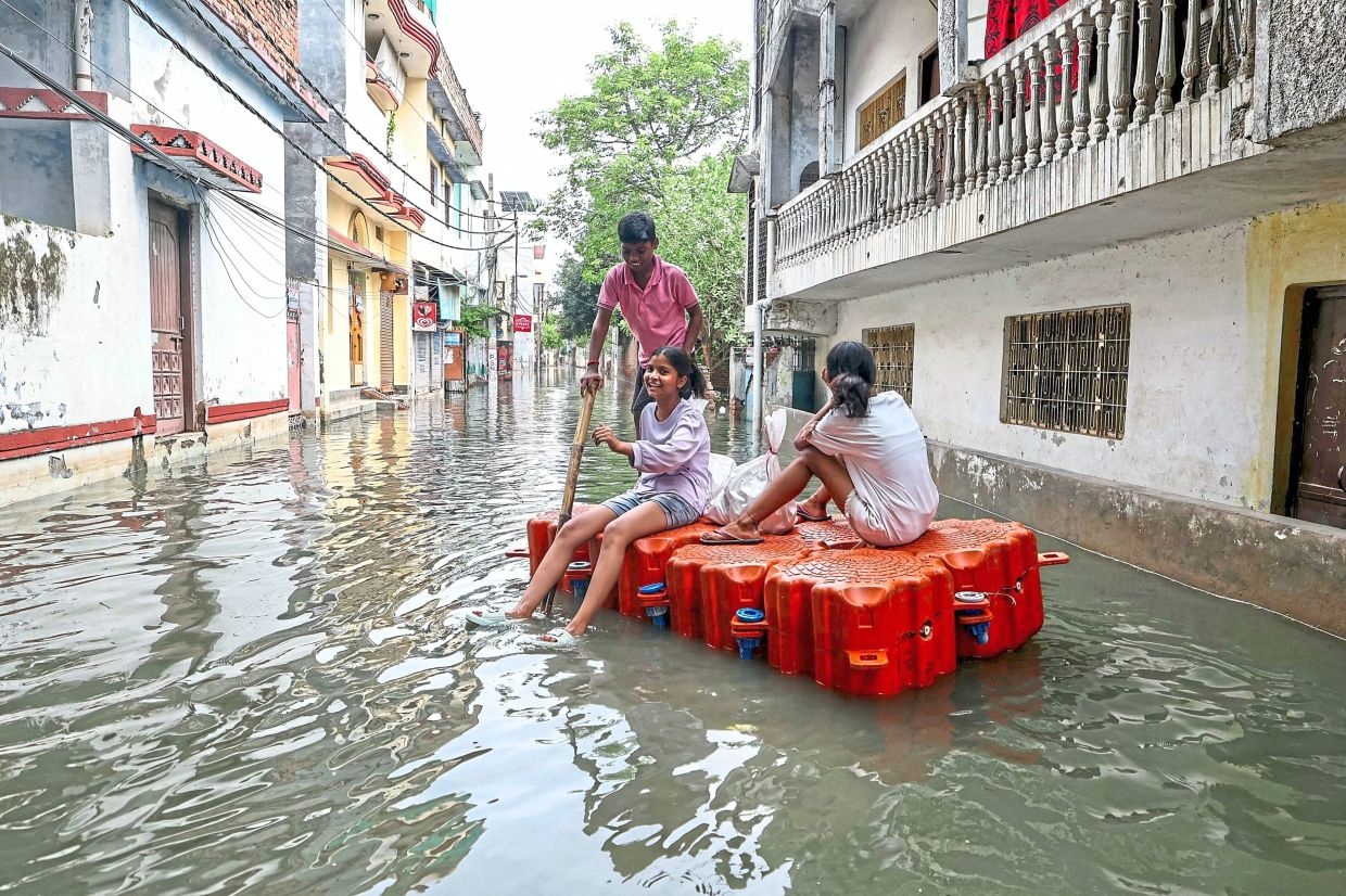 Residents stranded by floods along key pilgrim route