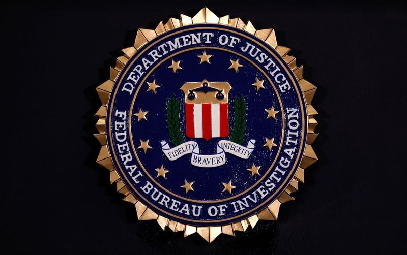 FBI ousts ex-acting director, other agents, in latest purge, people briefed say
