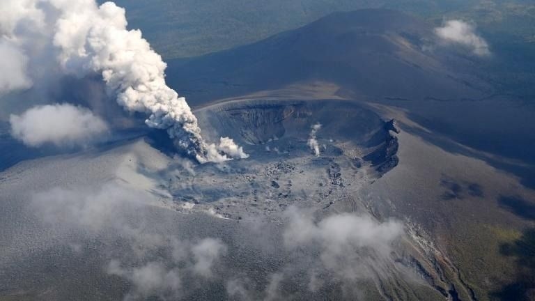 Japan's Shinmoedake volcanoe erupts, sending ash plume well above 3,000m