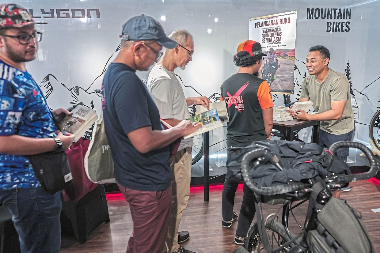 Malaysian launches book on 35,000km cycling journey across Asia