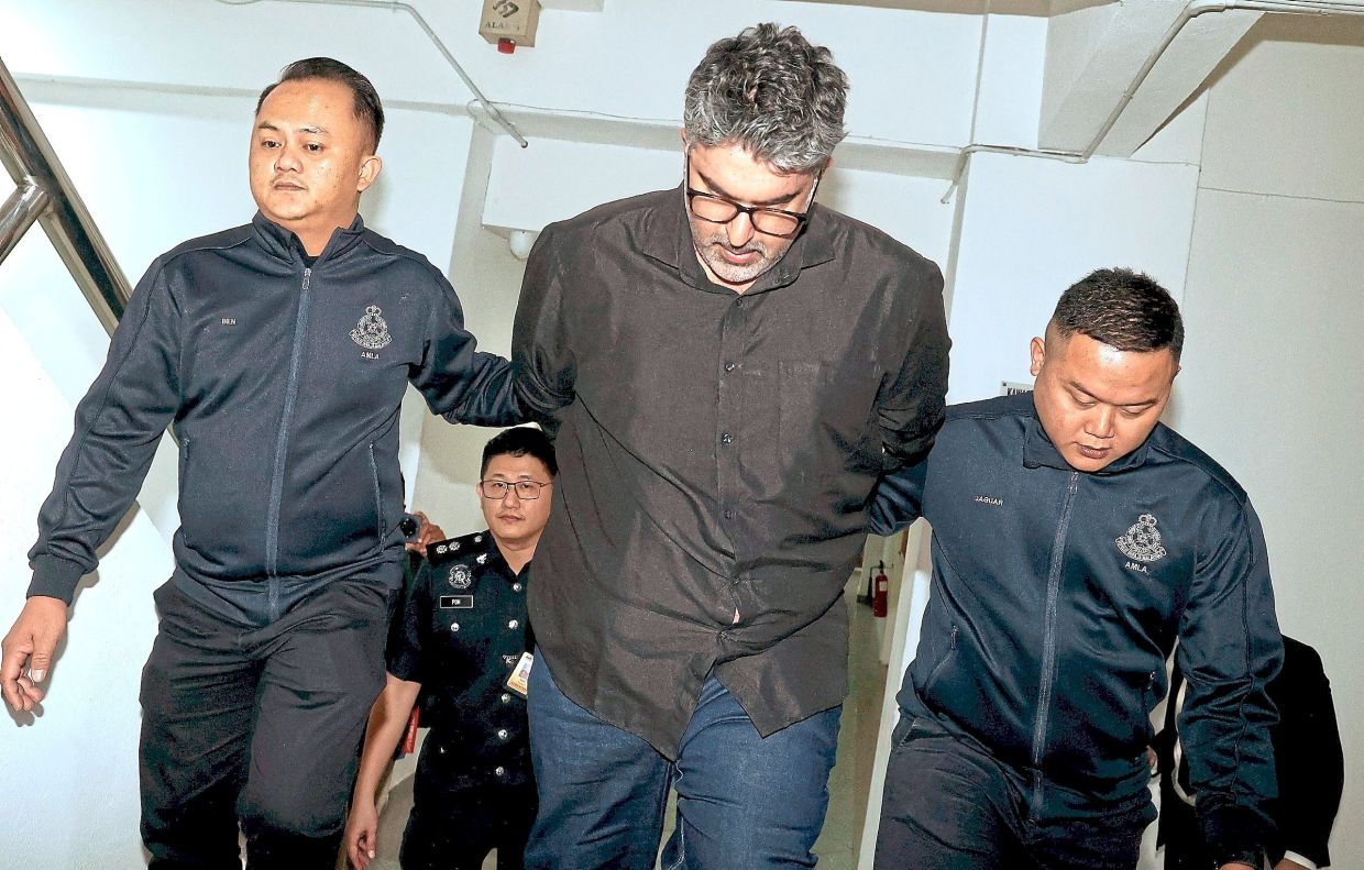 Project lead pleads not guilty to 68 charges of money laundering