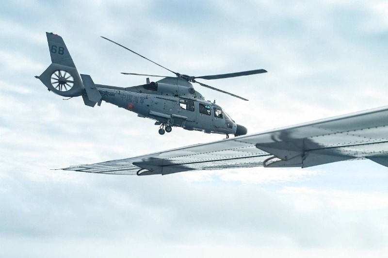 Chinese fighter 'intercepts' Philippine plane over disputed shoal, Manila says