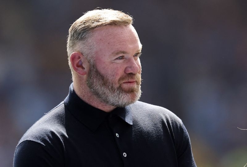 Soccer-Rooney says Brady questioning work ethic was unfair