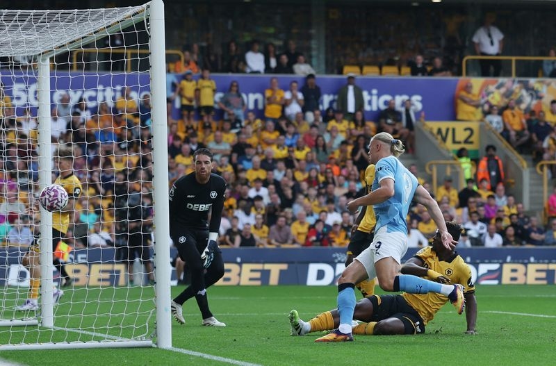 Soccer-Haaland gets double as Man City start with statement win over Wolves