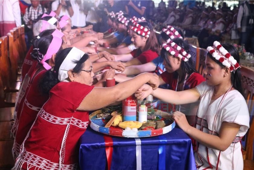Traditional Karen wedding ceremony with white silk thread held in Yangon ethnic village