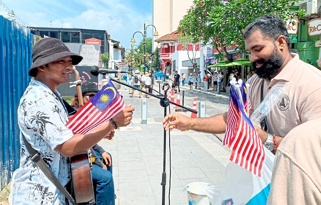 Youth group hands out 350 flags