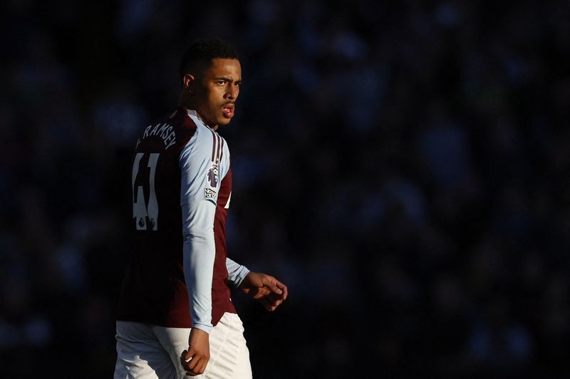 Soccer-Newcastle sign midfielder Ramsey from Villa