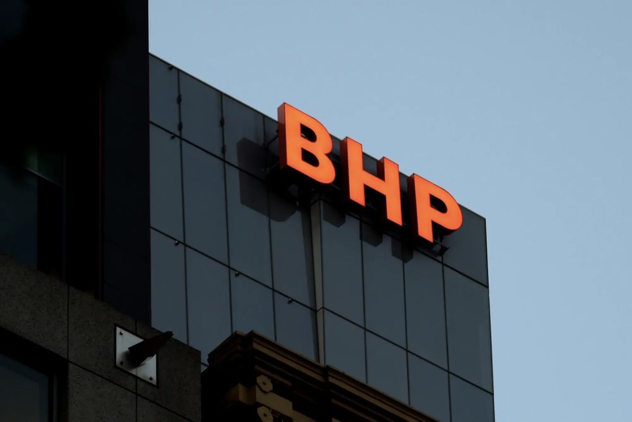 BHP profit tumbles 26% with iron ore, coal under pressure