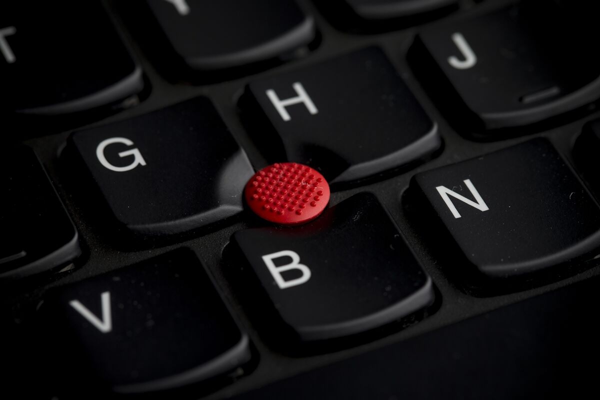 Lenovo Sales Beat Estimates Though Profit Sags From PC Rivalry
