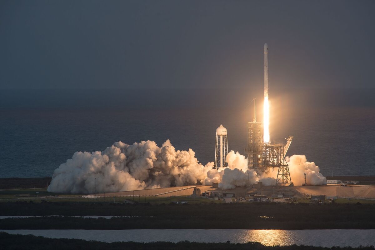 Musk Looms Over Latest Ergen Fight Threatening EchoStar Debt