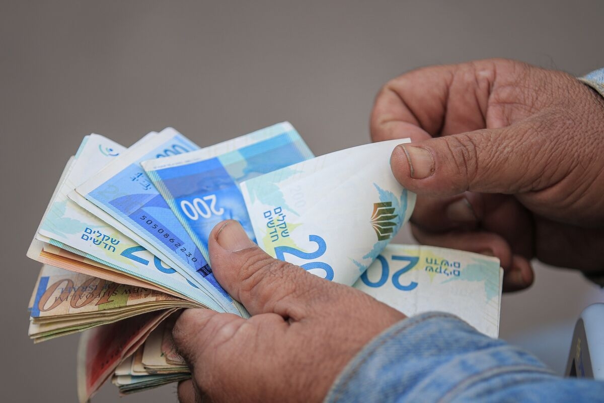 Israeli Shekel's Calm Under Threat as Options Signal Turmoil