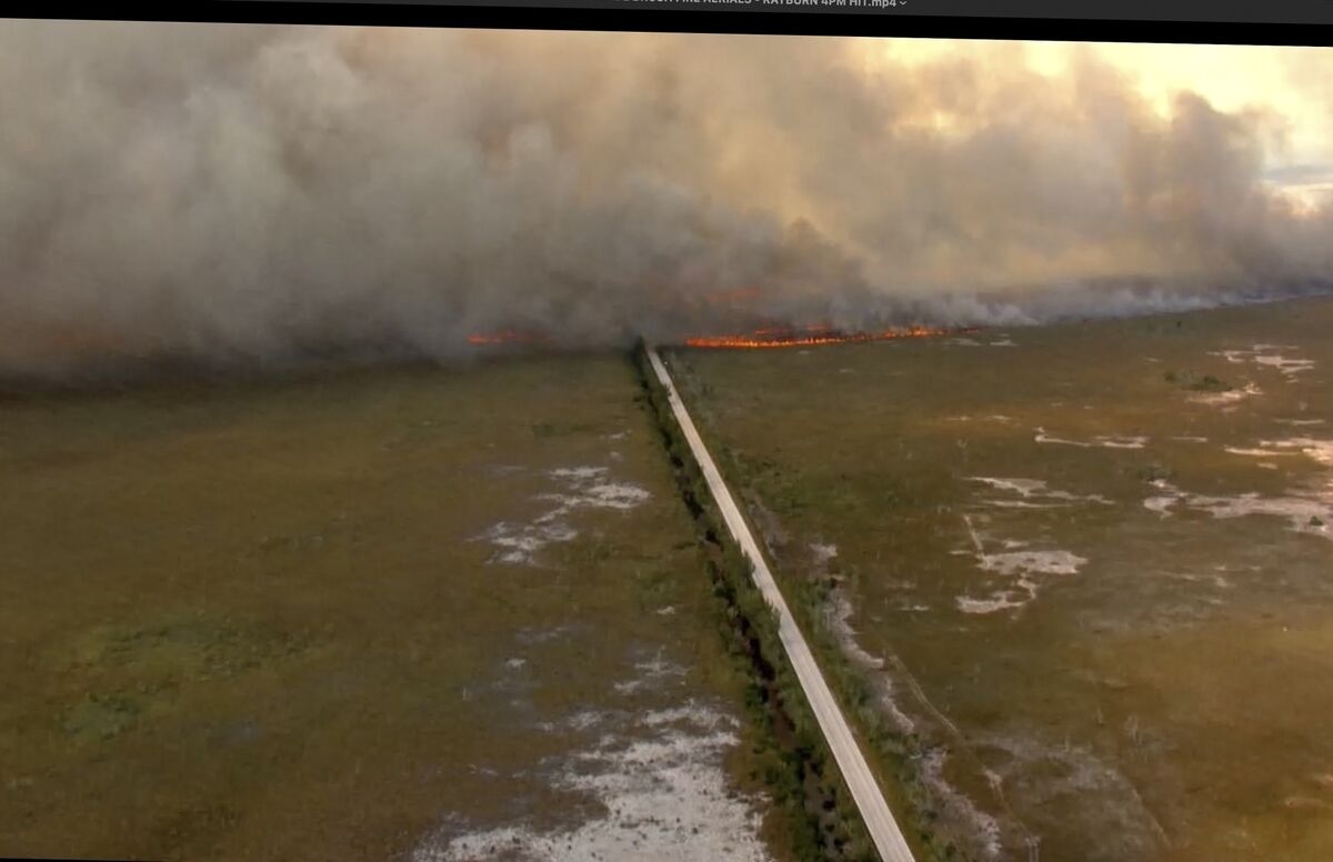 Wildfires Rage Near Houston and Miami as High Winds Fan Blazes