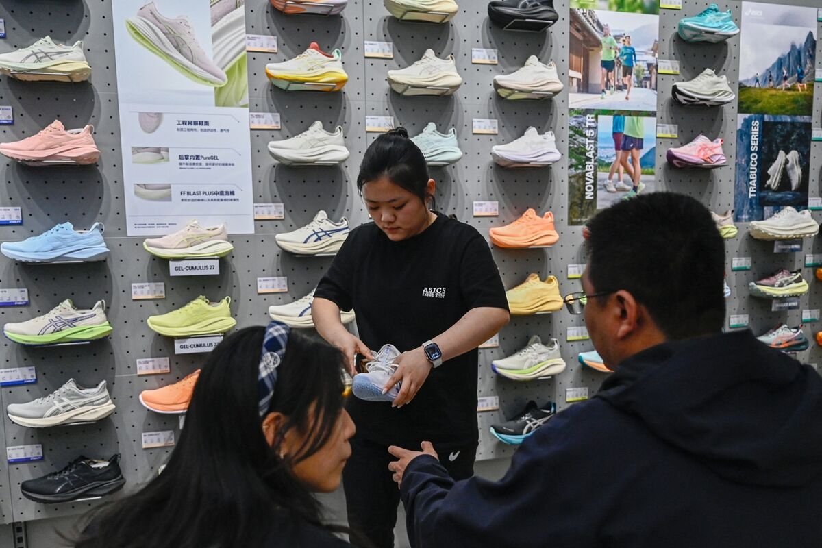 Asics Shares Surge as Raised Guidance Predicts Record Profit
